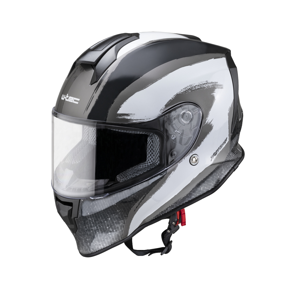 Moto přilba W-TEC Integra Graphic  Black-White  L (59-60).

Komfortní podšívka je odnímatelná a omyvatelná a je vyrobena z prodyšného materiálu odvádějícího pot tak, aby byla pohodlná za všech okolností.

Plně ventilovaná lehká skořepina závodního stylu s agresivním tvarem a atraktivním barevným motivem zajistí, že s moto přilbou W-TEC Integra Graphic vyniknete v jakémkoliv davu.

Bonusem k helmě je druhé plexi v balení, které je zatmavené, a tak se hodí především pro denní jízdu za jasného počasí, zejména proti ostrému slunci.


	aerodynamický tvar
	uzavíratelný ventilační systém s otvory na bradě a horní části přilby (Crown Ventilation System)
	výdechy na zadní části přilby
	čiré plexi odolné proti poškrábání, odnímatelné
	druhé zatmavené plexi součástí balení
	s přípravou pro Pinlock 70 (piny na folie proti zamlžování)
	vyjímatelné prodyšné polstrování, omyvatelné
	rychloupínací přezka
	atraktivní grafika
	materiál skořepiny: ABS
	hmotnost: 1400 g
	certifikace: ECE-R 22.05 (bezpečnostní norma pro evropský trh)